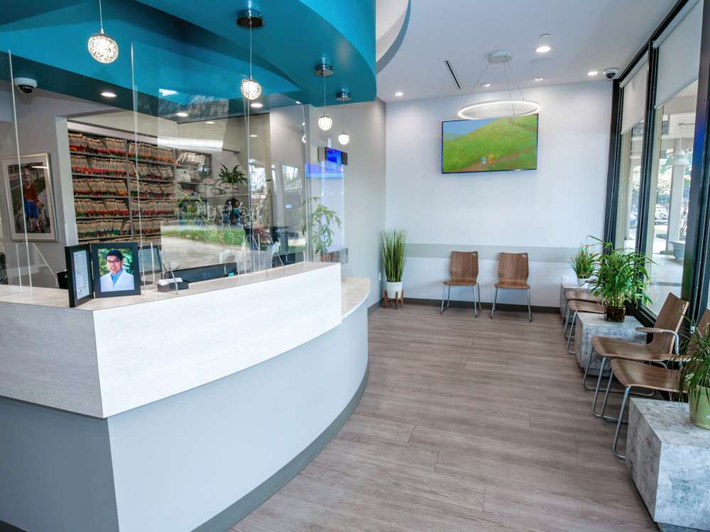 Front desk reception area with curved counter