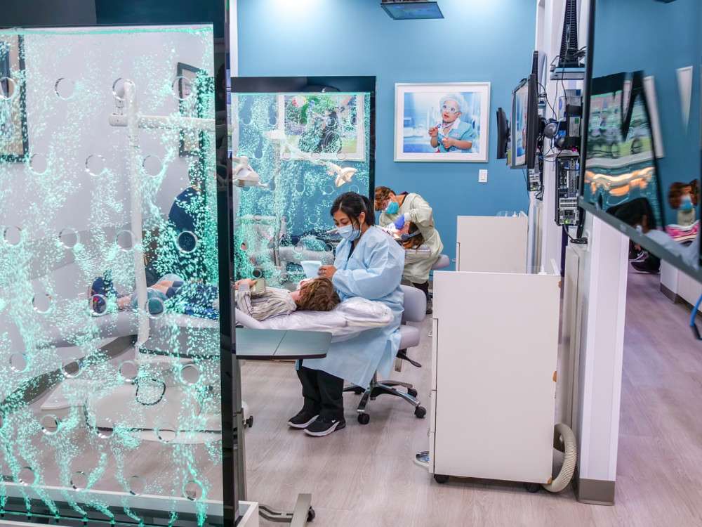 A child being treated with bubble panels in the background